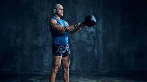 Editorial illustration for Swing, Clean, or Snatch? Choosing the Right Kettlebell Ballistic for Your Power Goals